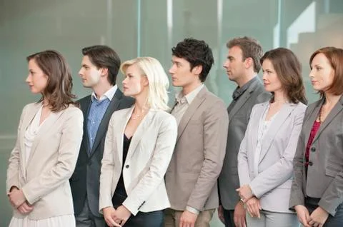 Business executives standing together Stock Photos