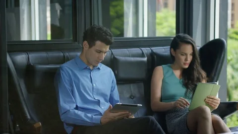 Business executives using digital tablet in office Stock Footage 75451510