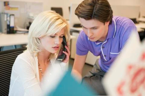 Business executives working in an office Stock Photos