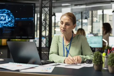 Business expert using AI algorithms and machine learning for forecasting Stock Photos