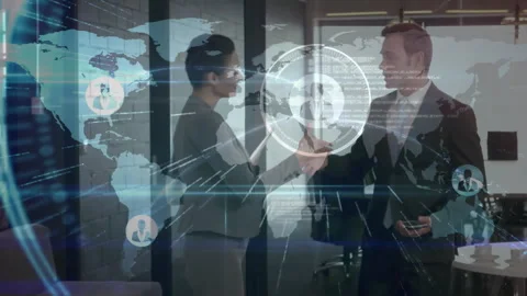 Business experts presenting tablet data and activating holographic world map for Stock Footage 310643518