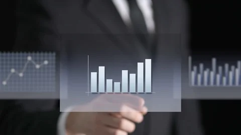 Business figures, graphs, chart and statistics in hologram touch screen. Stock Footage 123702153