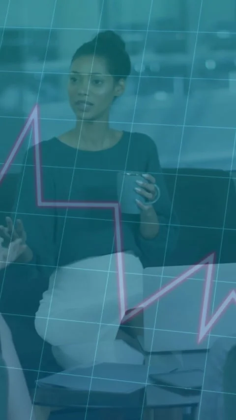 Business graph animation over diverse colleagues discussing in modern office Stock Footage 342015691