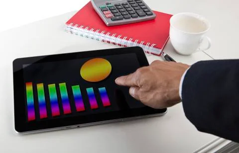 Business graph report on  tablet screen monitor 写真素材