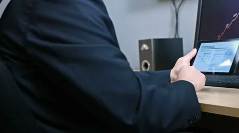 Business Graphs on Tablet Stock Footage 35846597