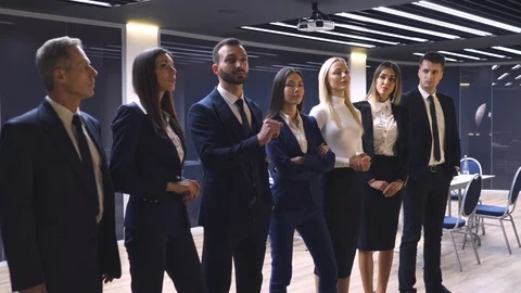 The business group of seven working on a virtual screen Stock Footage 124440965