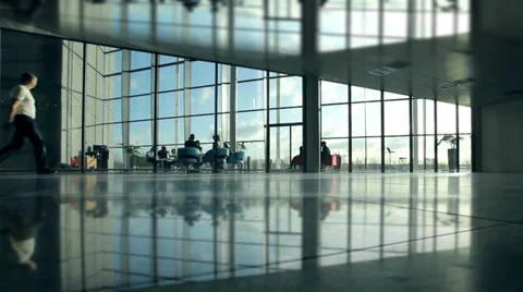 Business group walking through large contemporary office building at sunrise. 動画素材 32718140