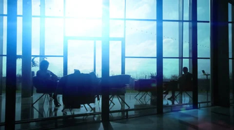 Business group walking through large contemporary office building at sunrise. 스톡 동영상 32719422