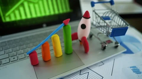 Business Growth and E-commerce Concept, Colorful bar graph, rocket, and sho.. Stock-Footage 304881933