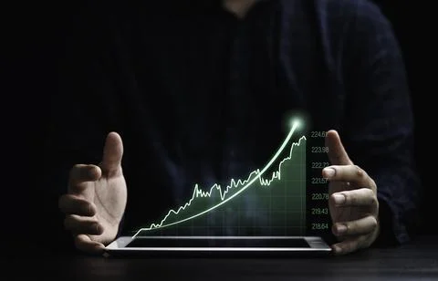 Business hand protect tablet with virtual green technical graph with increa.. Stock Photos