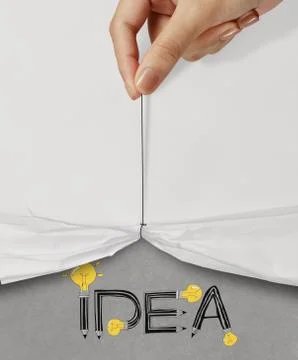 Business hand pull rope open wrinkled paper show idea design text as concept Stock-Illustration