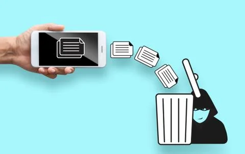 Business hand throw data file from mobile to trash bin Stock Photos