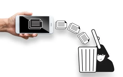 Business hand throw data file from mobile to trash bin Stock Photos