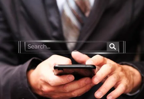 Business hand using smartphone with data search technology Stock Photos