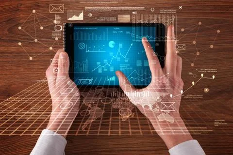 Business hands holding tablet Stockfoto's