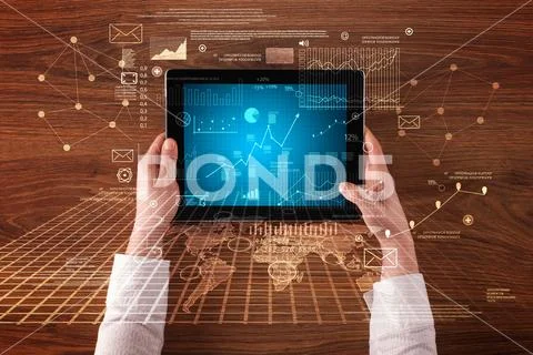 Business hands holding tablet Stock Photos