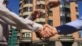 Business handshake and giving the keys HD Footage
