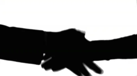 Business handshake silhouette Stock Footage