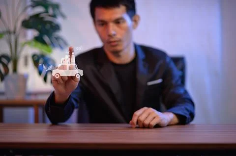 Business Impact Analysis Using CO2 Hologram Icon in Factory Settings Stock Photos