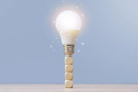 Business innovation and creative solution concept with glowing light bulb on  Stock Photos
