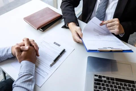 Business interview consider and asking candidate questions a resume conversat Stock Photos