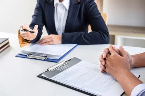 Business interview consider and asking candidate questions a resume conversat Stock Photos