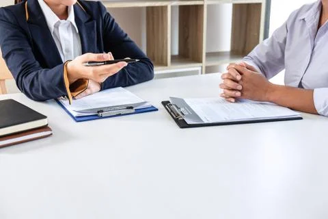 Business interview consider and asking candidate questions a resume conversat Stock Photos