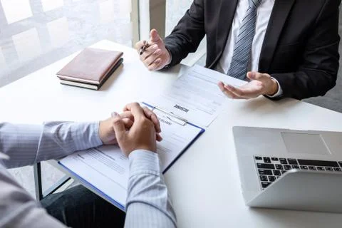Business interview consider and asking candidate questions a resume conversat Stock Photos