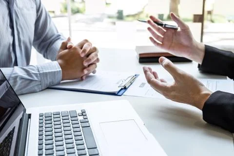 Business interview consider and asking candidate questions a resume conversat Stock Photos