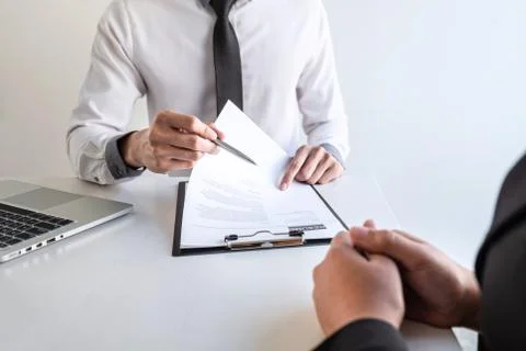 Business interview consider and asking candidate questions a resume conversat Stock Photos