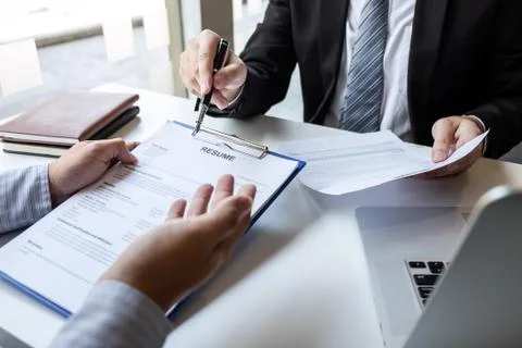 Business interview consider and asking candidate questions a resume conversat Stock Photos