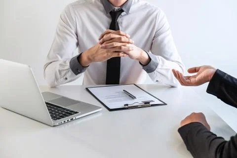 Business interview consider and asking candidate questions a resume conversat Stock Photos
