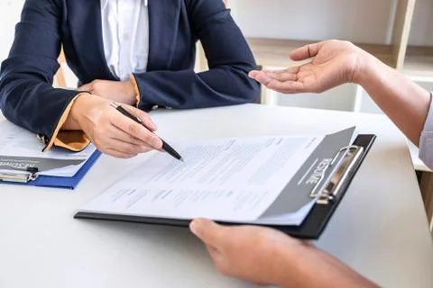 Business interview consider and asking candidate questions a resume conversat Stock Photos