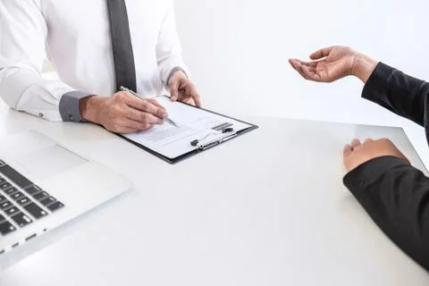Business interview consider and asking candidate questions a resume conversat Stock Photos