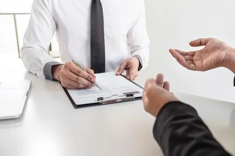 Business interview consider and asking candidate questions a resume conversat Stock Photos