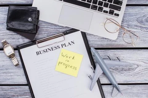 Business items and work in progress note. Stock Photos