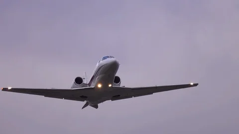 Business jet (private jet) taking off in a strong wind Stock Footage 126305760