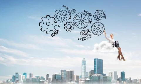 Business lady float on cloud touching drawn gear mechanism 写真素材
