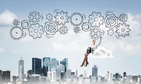 Business lady float on cloud touching drawn gear mechanism 写真素材