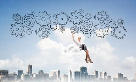Business lady float on cloud touching drawn gear mechanism 스톡 사진