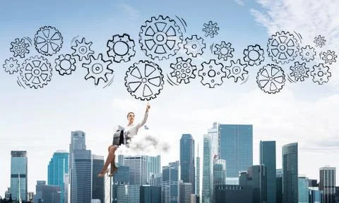 Business lady float on cloud touching drawn gear mechanism 库存照片