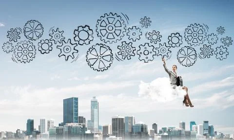Business lady float on cloud touching drawn gear mechanism Stockfoto's