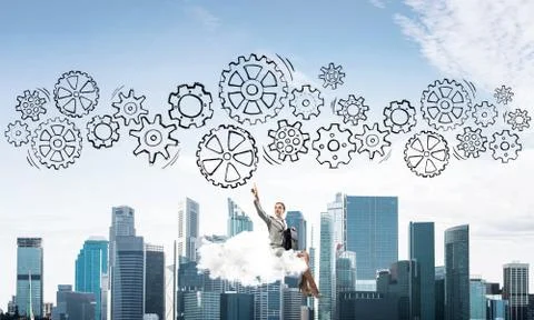 Business lady float on cloud touching drawn gear mechanism 库存照片