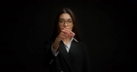 Business lady gestures to keep her mouth shut,keep secrets,not tell anyone. Stock Footage 171560514