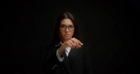 Business lady gestures to keep her mouth shut,keep secrets,not tell anyone. Stock Footage 171560945
