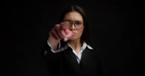 Business lady gestures to keep her mouth shut,keep secrets,not tell anyone. Stock Footage 194097942