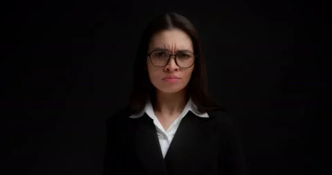 Business lady gestures to keep her mouth shut,keep secrets,not tell anyone. Stock Footage 194097980