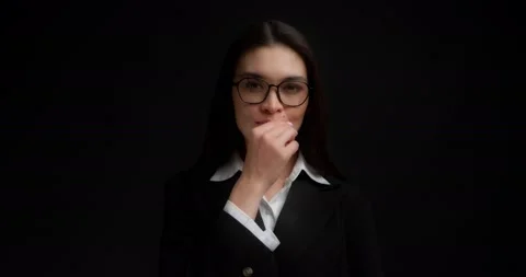 Business lady gestures to keep her mouth shut,keep secrets,not tell anyone. Stock Footage 194098197