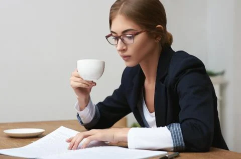 Business lady reading documents Stock Photos