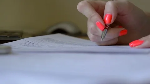 Business lady signs documents. Close-up Stock Footage 80312215